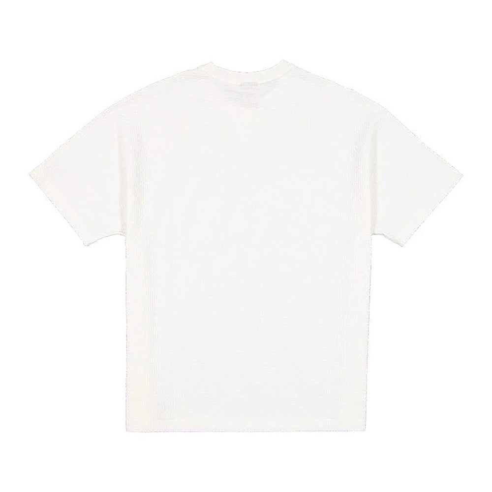 The model is wearing this New Era Black Label Seersucker T-Shirt in Cream. 2