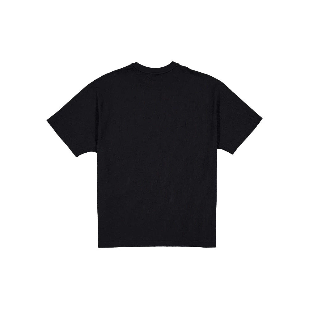 The model is wearing this New Era Black Label Seersucker T-Shirt in black. 2