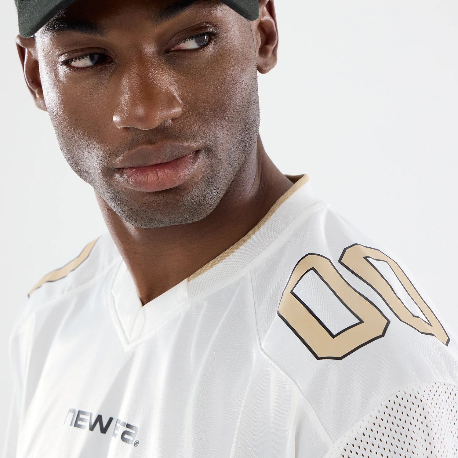 The model is wearing this New Era 1920 Mesh Jersey in white. 4