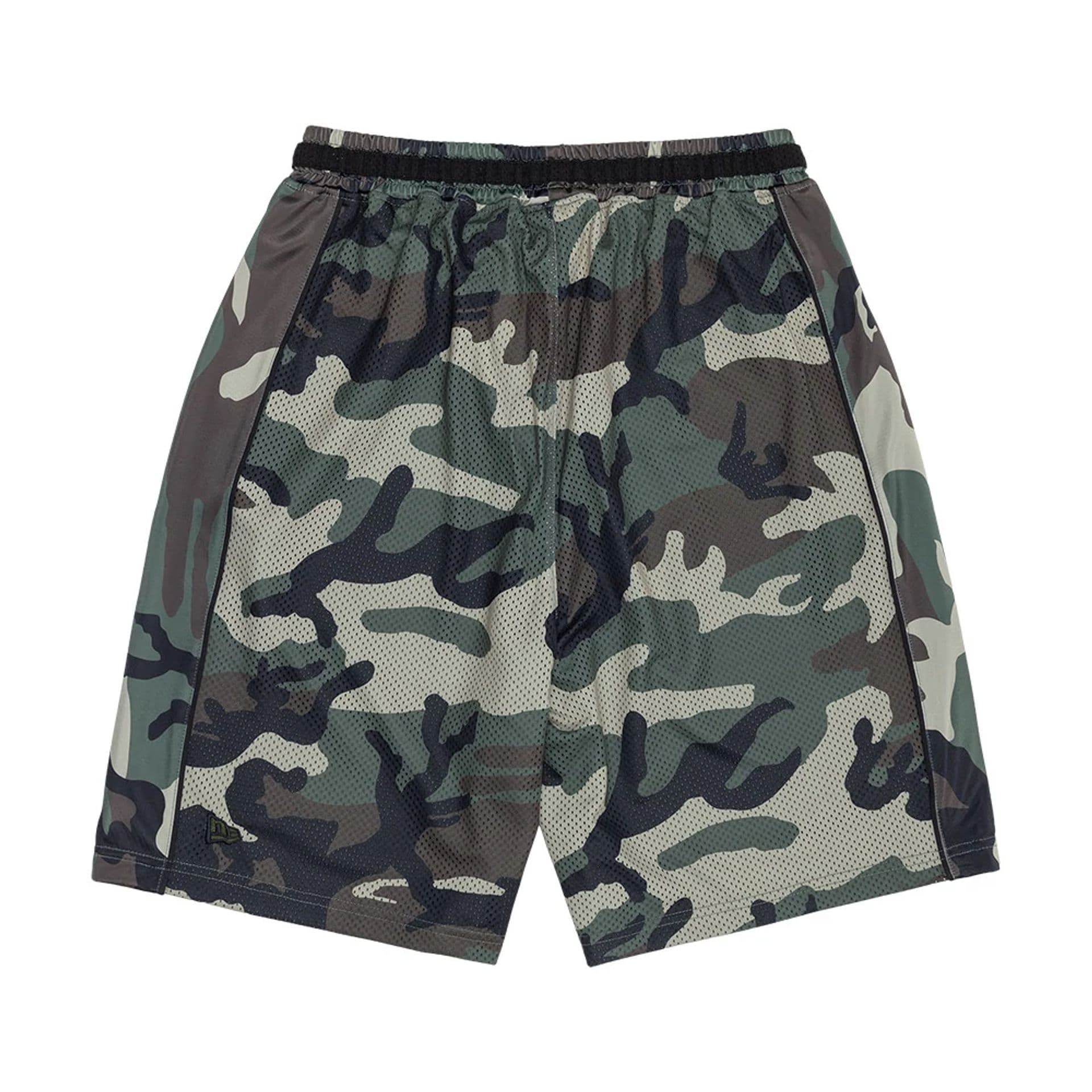 The model is wearing this New Era Bermuda Oversized Shorts in 6 Day Camo. 2