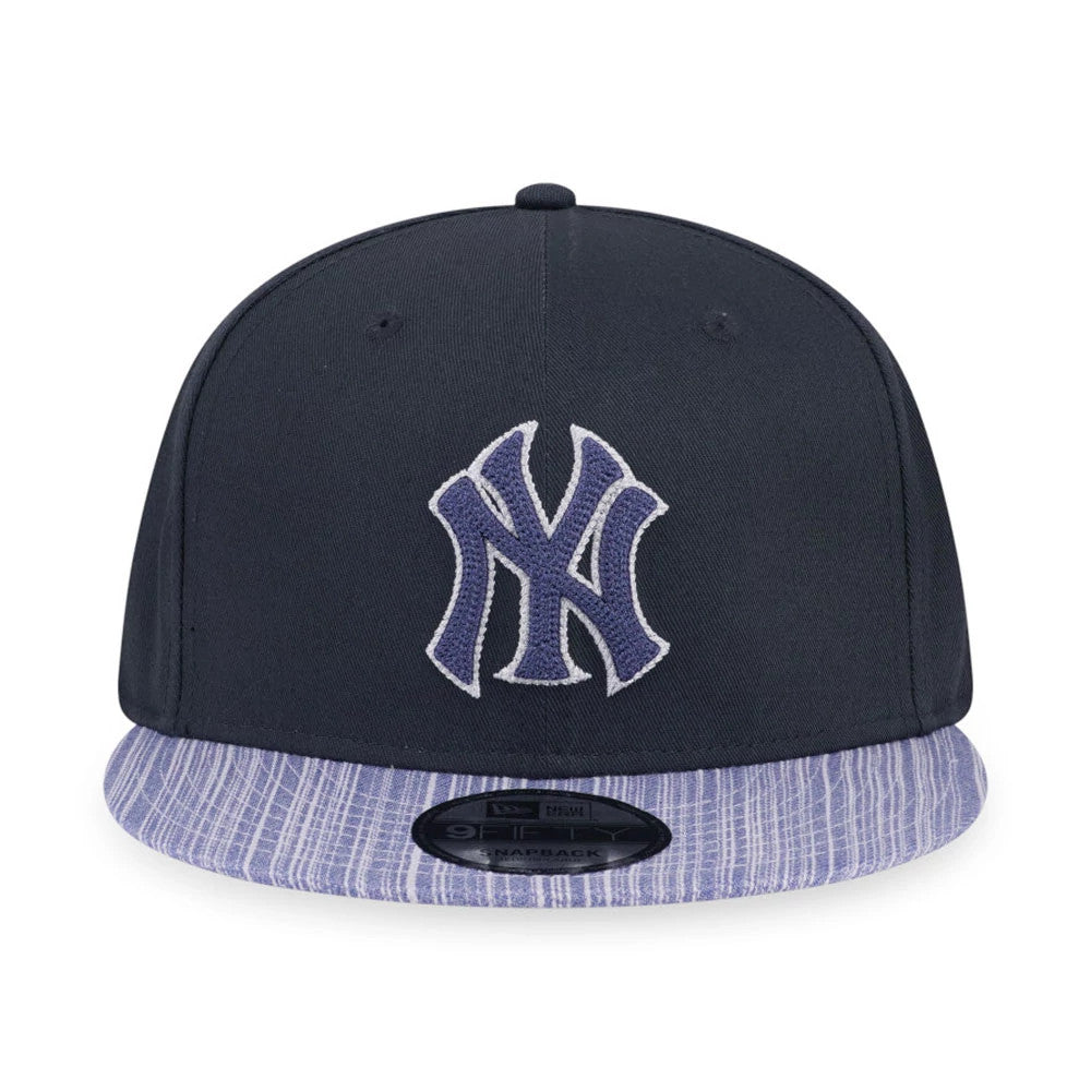 Pictured is this MLB Denim Patchwork New York Yankees 9FIFTY Snapback cap in navy. 2