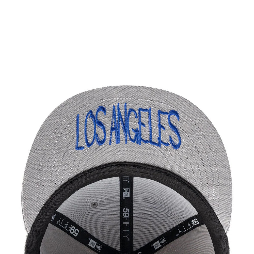 Los Angeles Dodgers MLB Punkcore Grey New Era 59FIFTY Fitted Cap, inside view showing black taping with white 59FIFTY branding, a blue LOS ANGELES embroidery on the grey underside of the visor, and the black sweatband.
