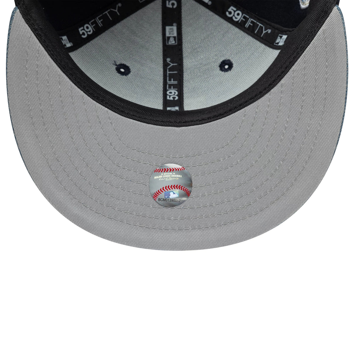 LA Dodgers MLB Denim Mix Navy New Era 59FIFTY Fitted Cap, inside view showing grey undervisor with a baseball design sticker, black taping with 59FIFTY branding, and dark eyelets on the crown lining.