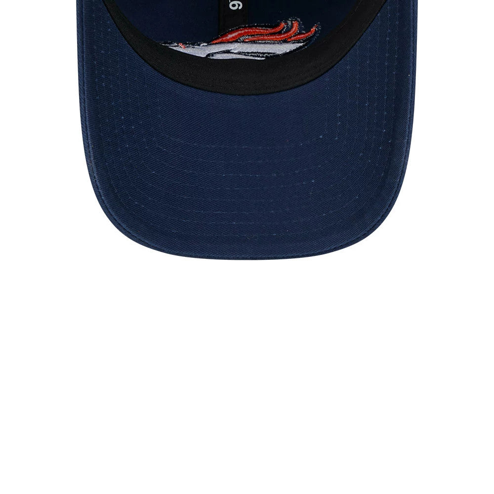 Denver Broncos NFL X Bad Bunny Navy New Era Casual Classic Adjustable Cap, inside view showing black taping with white branding and the embroidered Broncos logo on the navy undervisor.