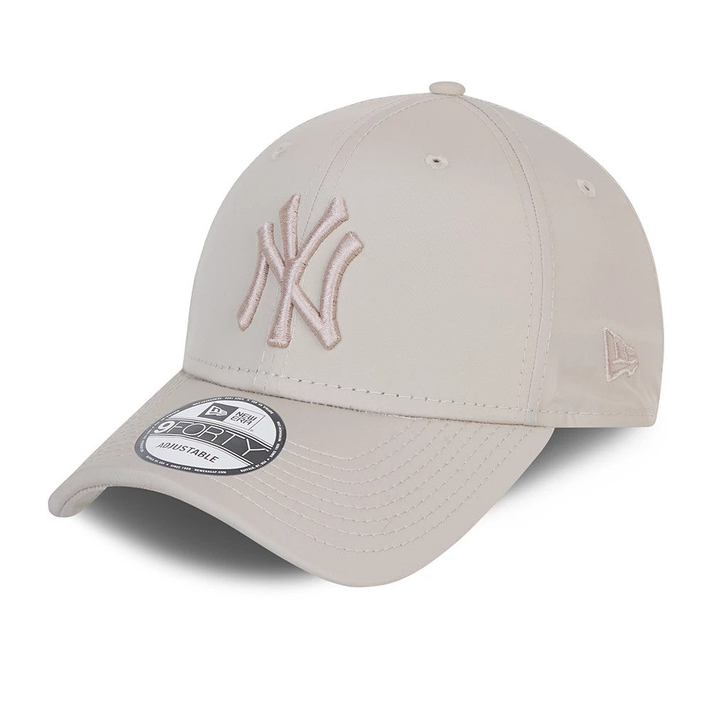 New York Yankees Tonal Stone New Era 9FORTY Cap, three-quarter view showing raised tonal embroidery of the NY Yankees logo on the front panel, stitched stone visor with 9FORTY size sticker, and New Era flag logo on the left side.