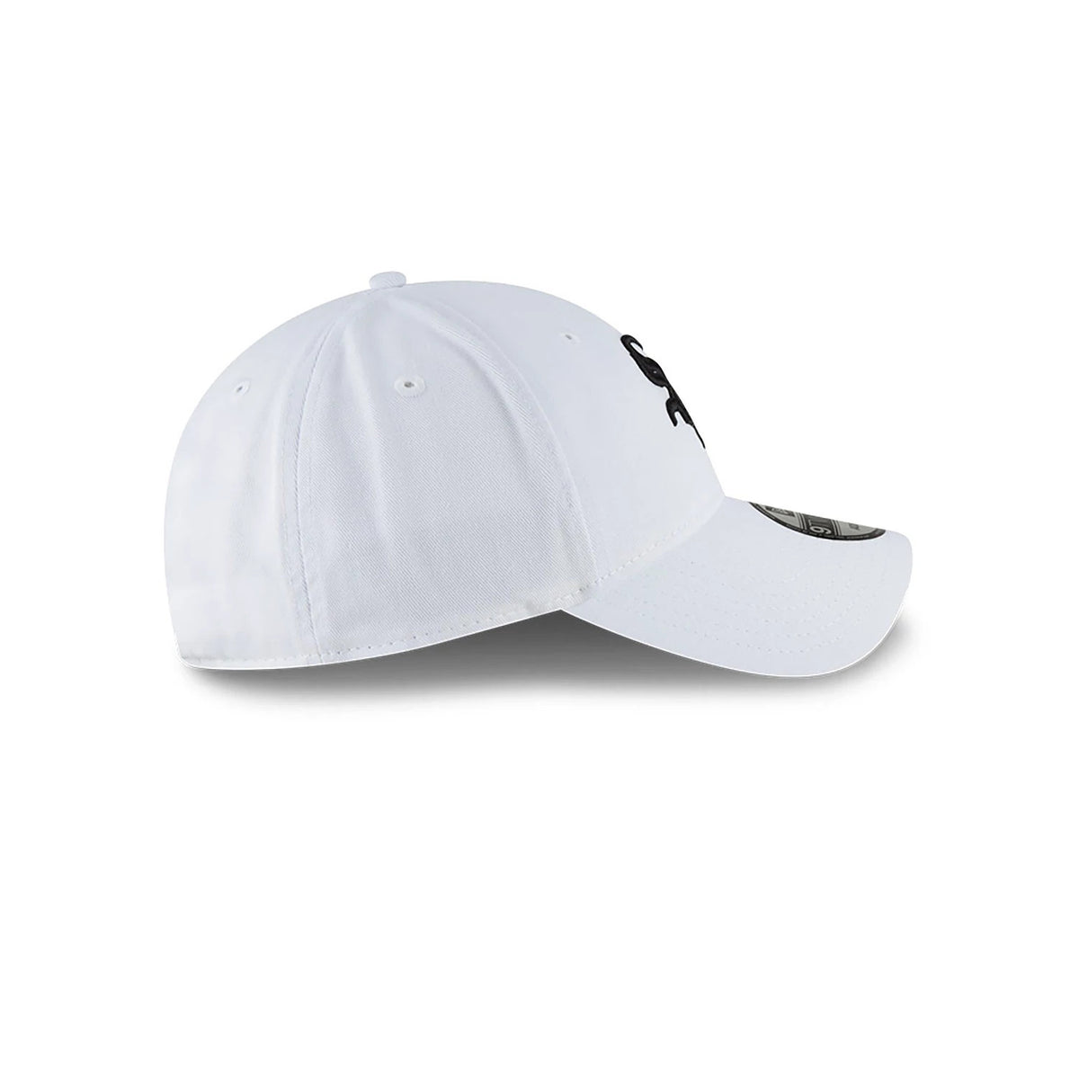 MLB Core Classic Chicago White Sox White New Era 9TWENTY Adjustable Cap, side view showing the curved visor, white top button, black embroidered Chicago White Sox logo on the front panel and 9TWENTY size sticker on the visor.
