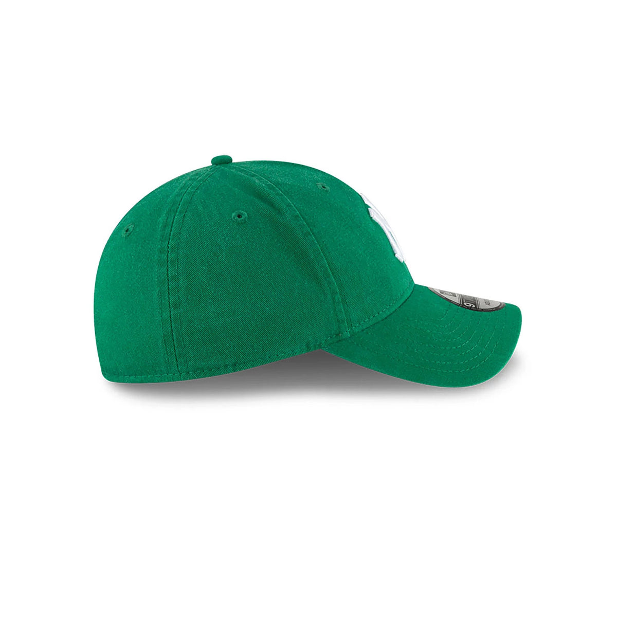 New York Yankees MLB Core Classic Green New Era 9TWENTY Adjustable Cap, side view showing the curved visor with a 9TWENTY size sticker, structured green crown, and embroidered white NY logo on the front panel.