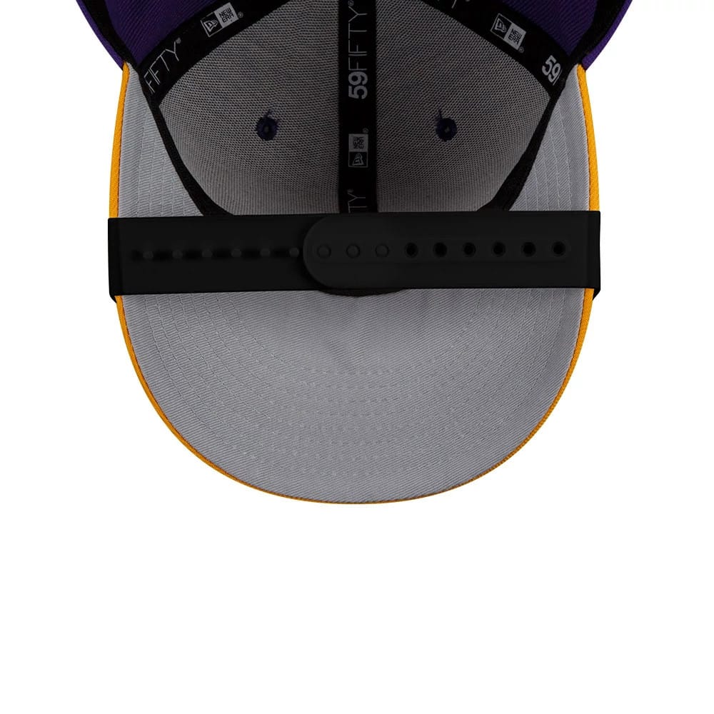 New Era Black Visor Curver, inside view showing the grey undervisor with black taping inscribed with 59FIFTY, purple interior panels with matching embroidered eyelets, and a black snapback closure.