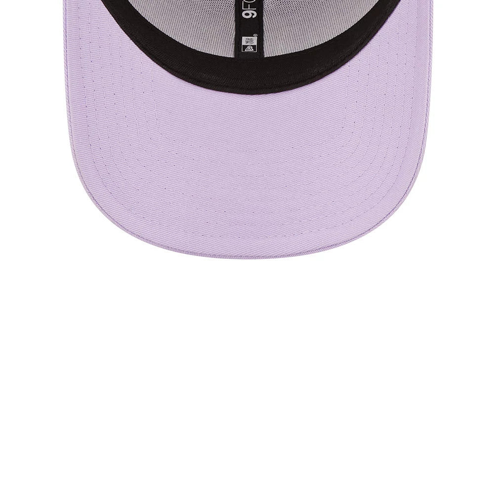 New York Yankees League Essential Purple New Era 9FORTY Adjustable Cap, inside view showing the purple undervisor, black sweatband with size label, and the MLB Batterman logo on the taping.