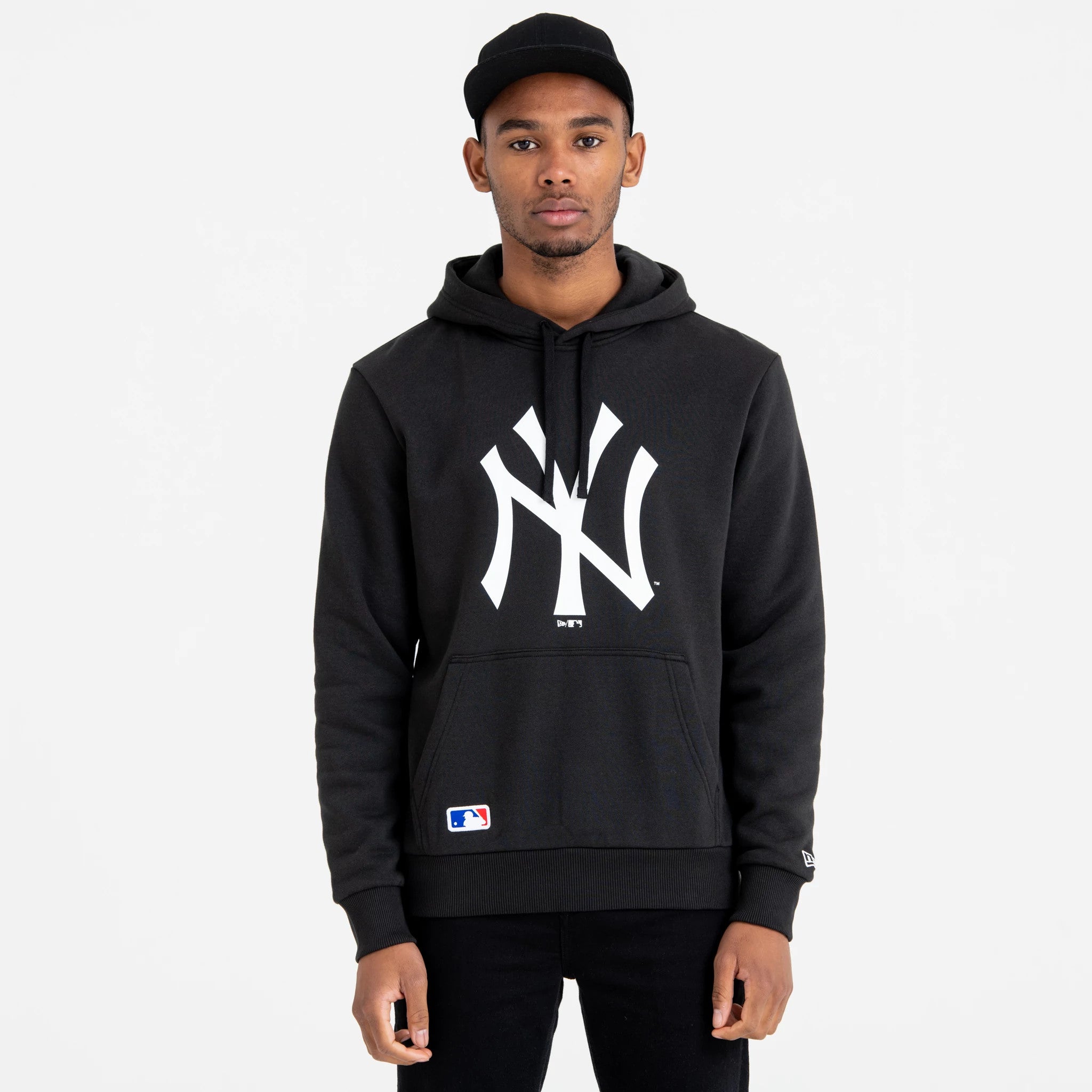 New York Yankees MLB Regular Black Pullover Hoodie, front view showing the large white New York Yankees logo centred on the chest, a small MLB logo on the front pocket, and a debossed New Era logo on the left cuff.