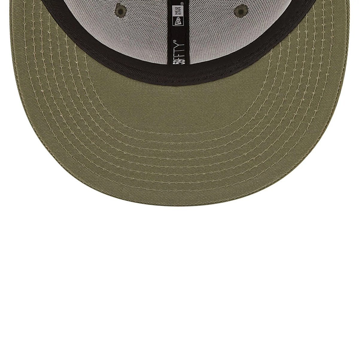 New York Yankees League Essential Green New Era 59FIFTY Fitted Cap, inside view showing black taping with white 59FIFTY branding, a grey sweatband, and olive undervisor, all centred within the structured crown.