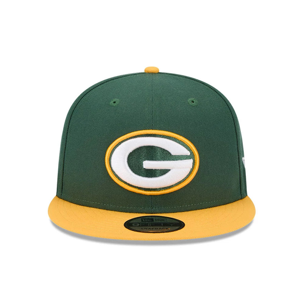 Green Bay Packers NFL Evergreen Dark Green New Era 9FIFTY Snapback Adjustable Cap, front view with a raised embroidered white and gold Packers logo on the dark green crown, yellow visor, and 9FIFTY size sticker.