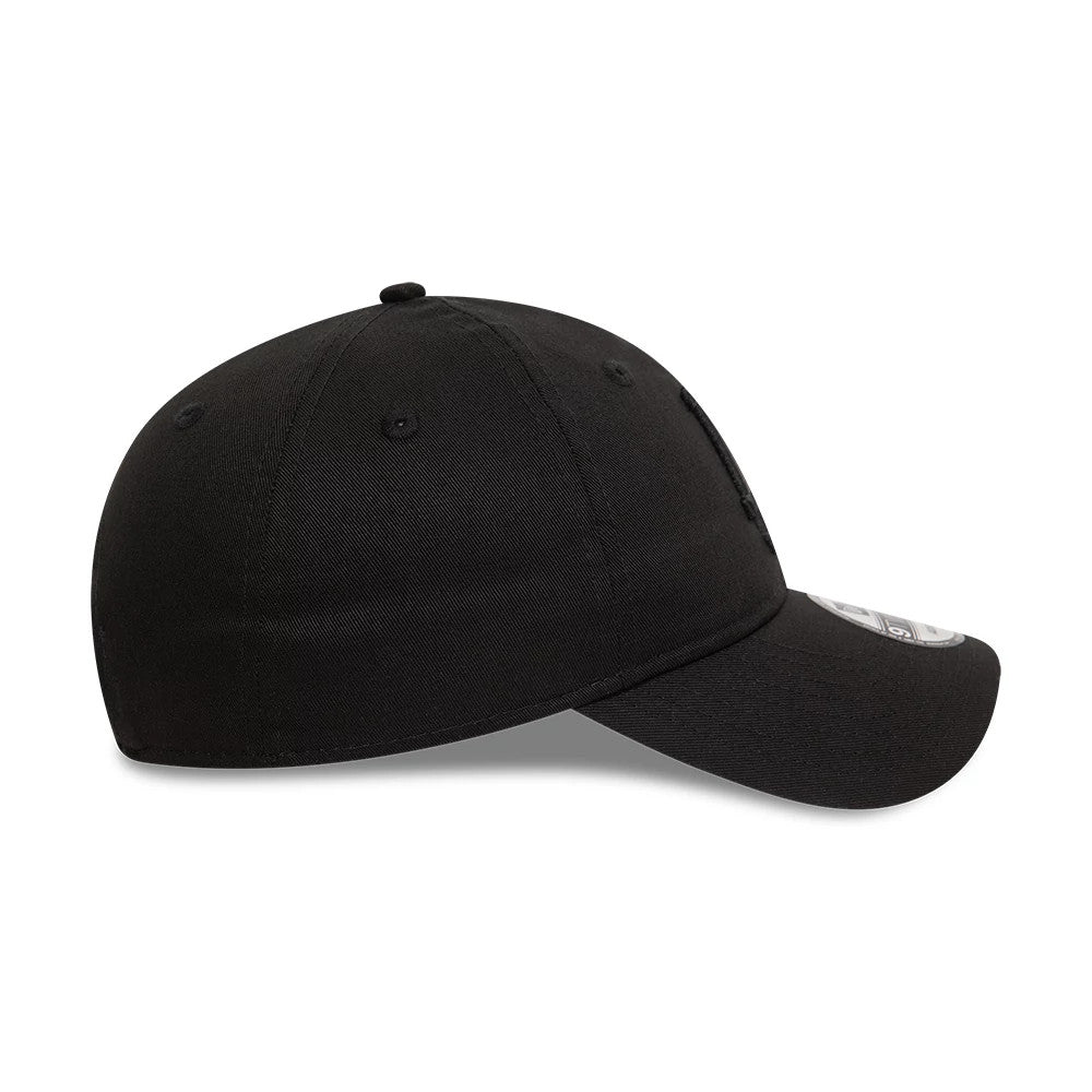 LA Dodgers League Essential Black New Era 9TWENTY Adjustable Cap, side view showing the curved visor, embroidered eyelets on the structured black crown, and the silver 9TWENTY size sticker on the top of the visor.