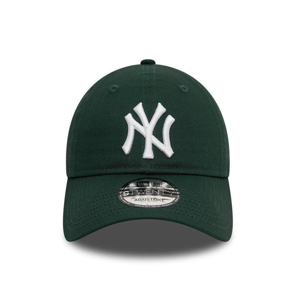 New York Yankees League Essential Dark Green New Era 9TWENTY Adjustable Cap, front view showing a raised white NY logo on the dark green front panels, curved visor with a 9TWENTY size sticker on the top.