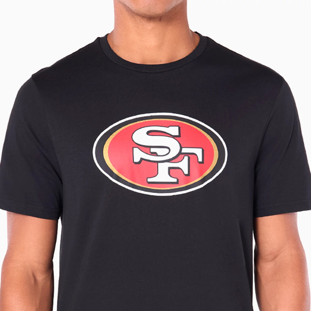 New Era San Francisco 49ers NFL Black T-Shirt, front view showing a large printed team logo centred on the chest with a red background and white lettering enclosed in a gold and black oval on the plain black fabric.