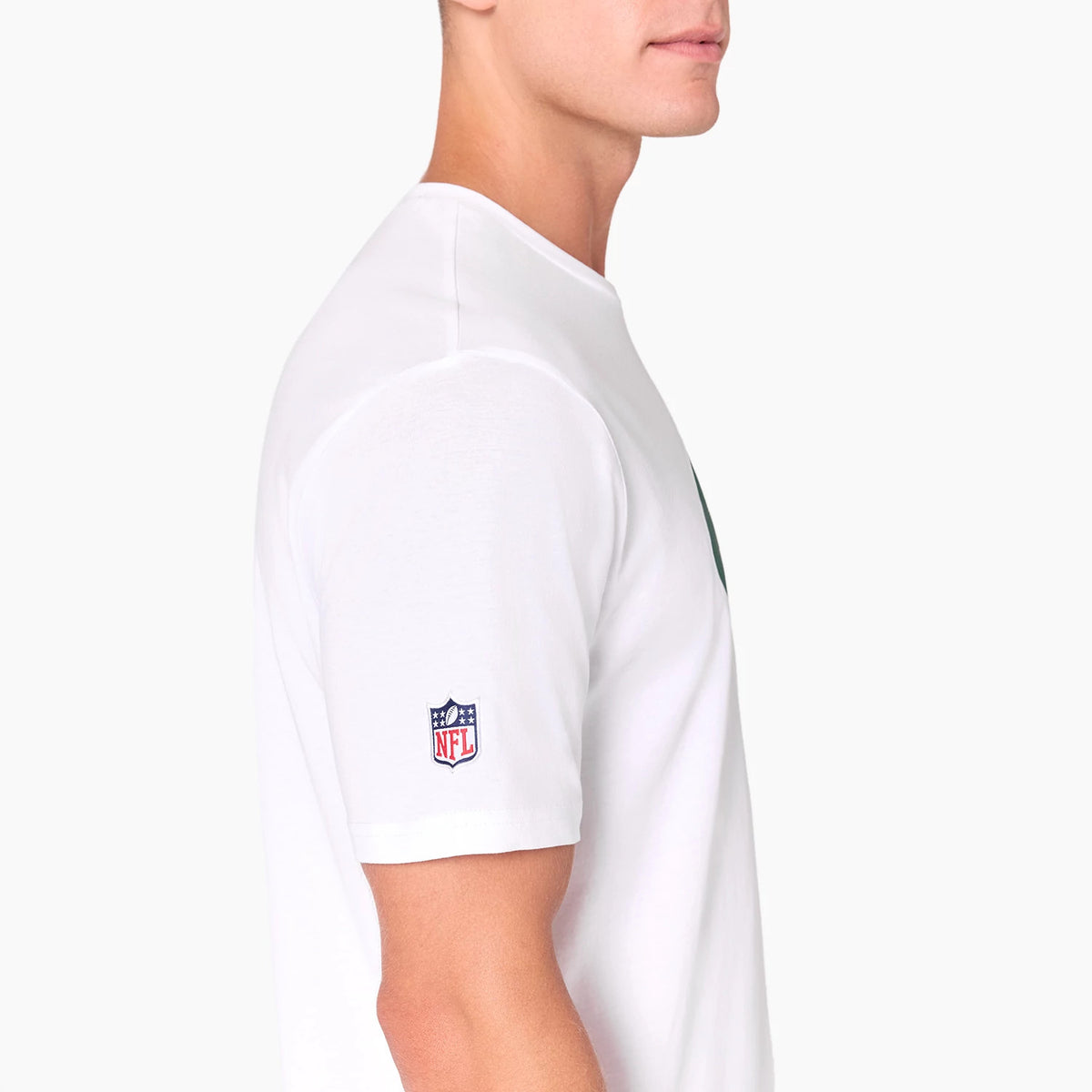 New Era New York Jets NFL White T-Shirt, side view showing the short sleeve with an embroidered NFL logo near the hem, a plain white surface across the back, and a round neckline fitting closely at the collar.
