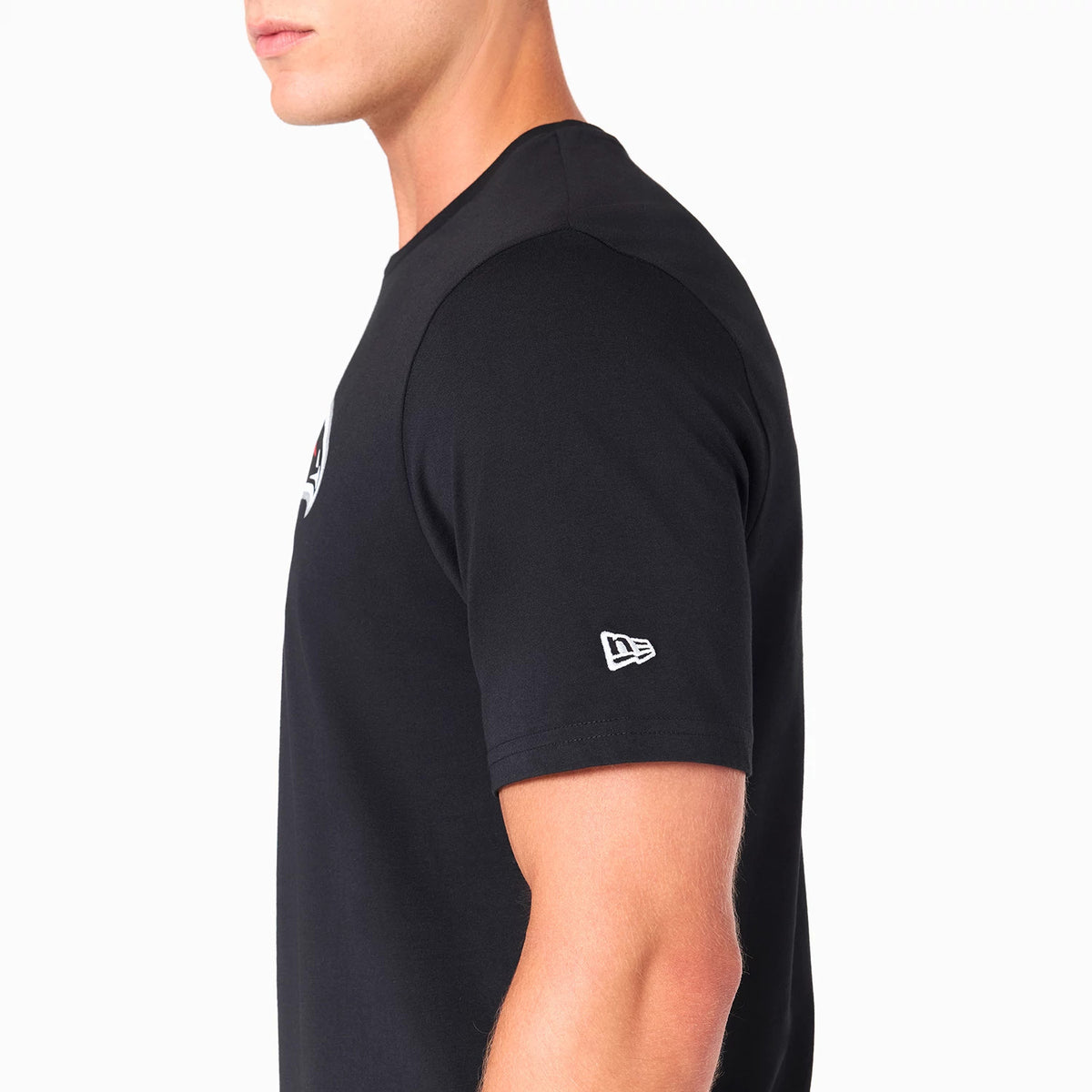 New Era Atlanta Falcons NFL Black T-Shirt, side view displaying a white embroidered New Era logo on the sleeve and a partially visible team logo on the chest against the plain black fabric.