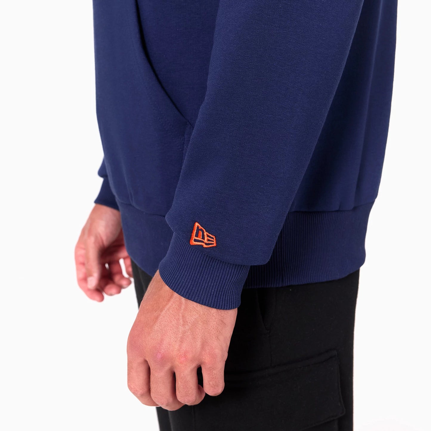 The Male model is wearing Denver Broncos NFL Navy Pullover Hoodie 7