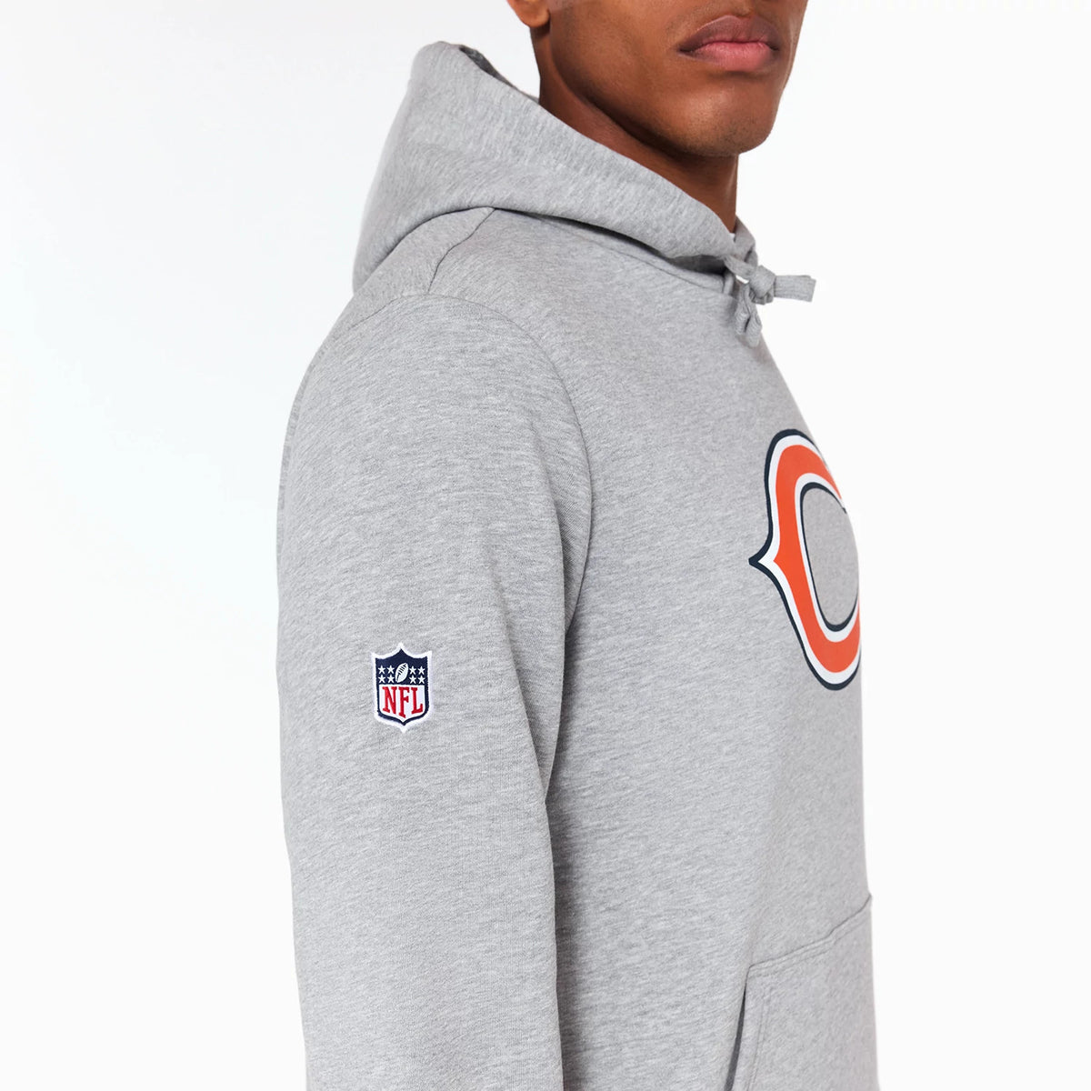 New Era Chicago Bears NFL Grey Pullover Hoodie, side view showing the large orange and navy Chicago Bears logo on the chest, a raised NFL logo on the upper left sleeve, and a drawstring on the hood.