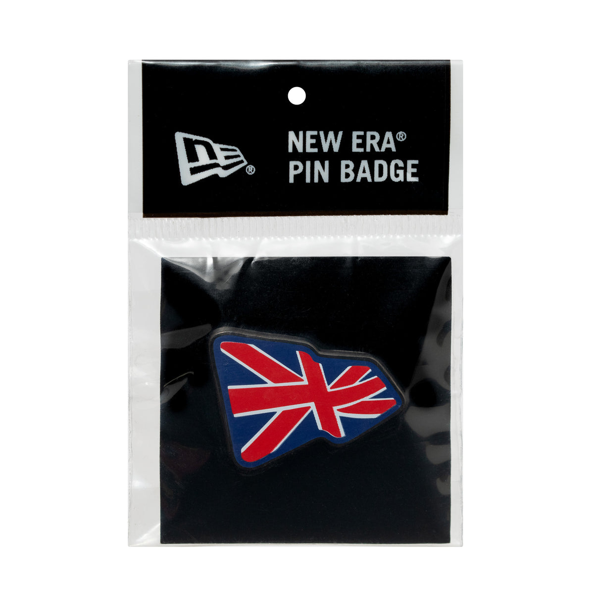 New Era Union Jack Flag Infill Red Pin Badge, front view showing a Union Jack design in red, white, and blue with a distinct shape, set against a black background in plastic packaging with the New Era logo printed at the top.