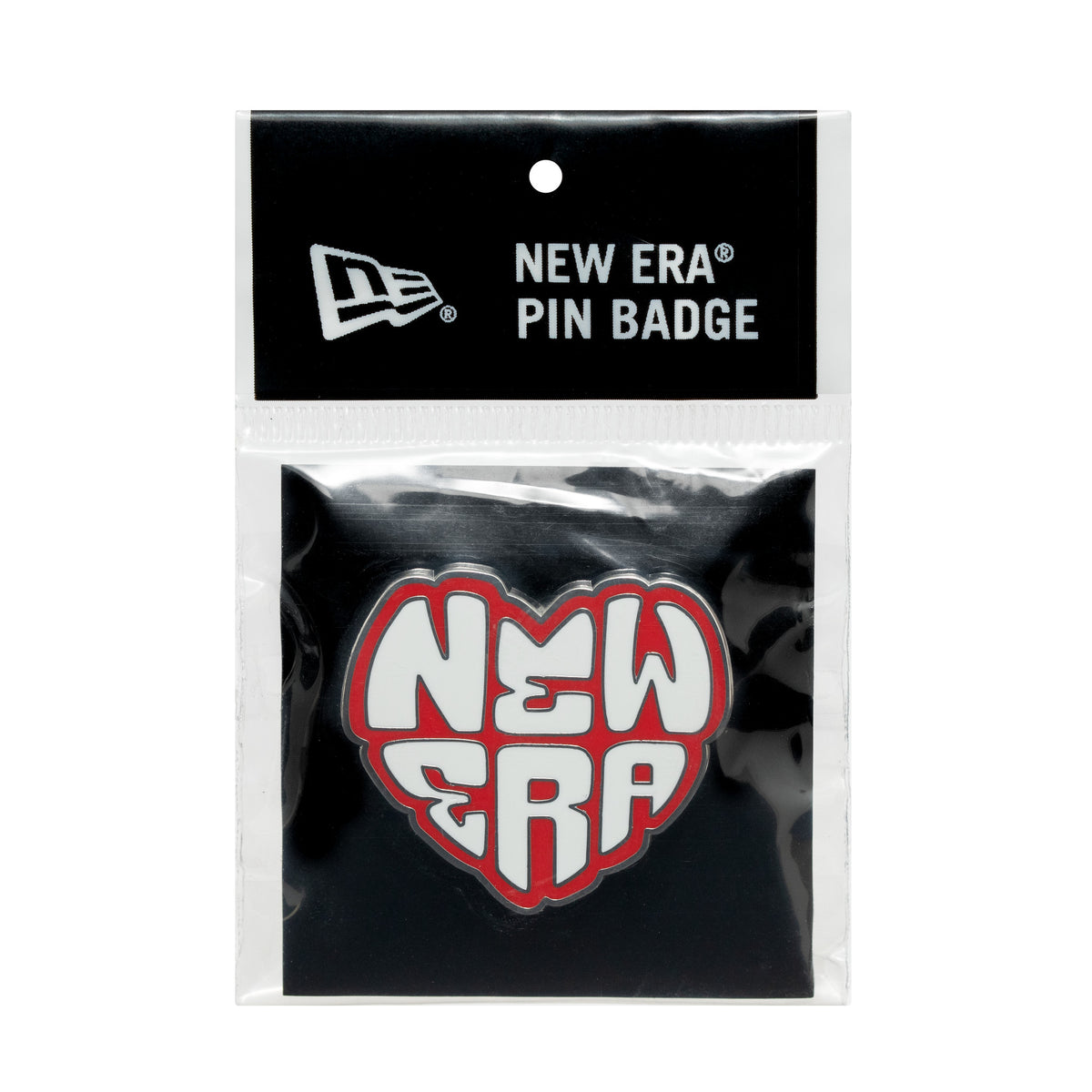 New Era Heart Silver Pin Badge, front view showing a heart-shaped design with raised white letters outlined in red spelling NEW ERA on a black background, encased in clear packaging with a branded header card at the top.