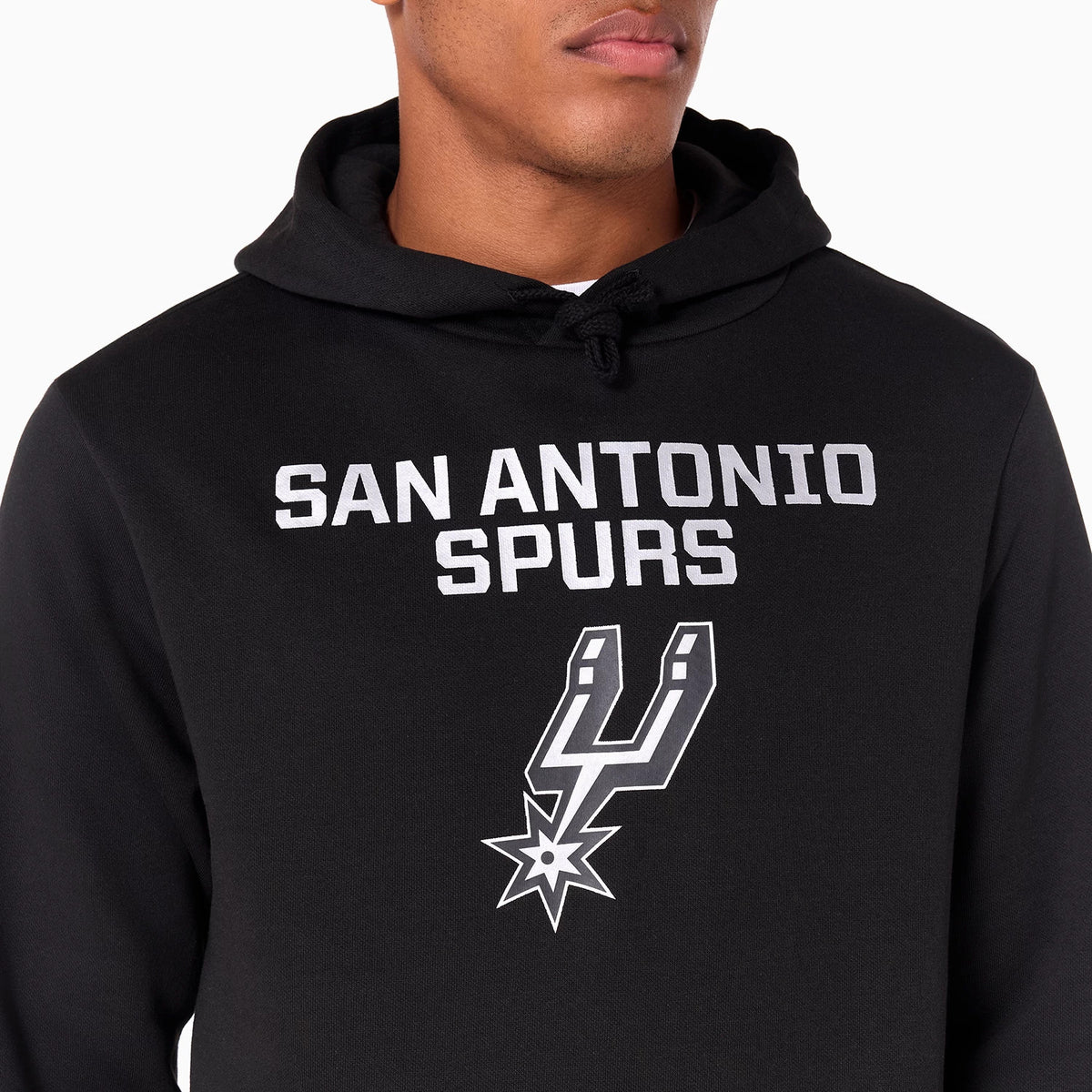 New Era San Antonio Spurs NBA Black Pullover Hoodie, front view showing the black fabric with San Antonio Spurs text and the Spurs logo in white across the chest, and a drawstring detail on the hood.