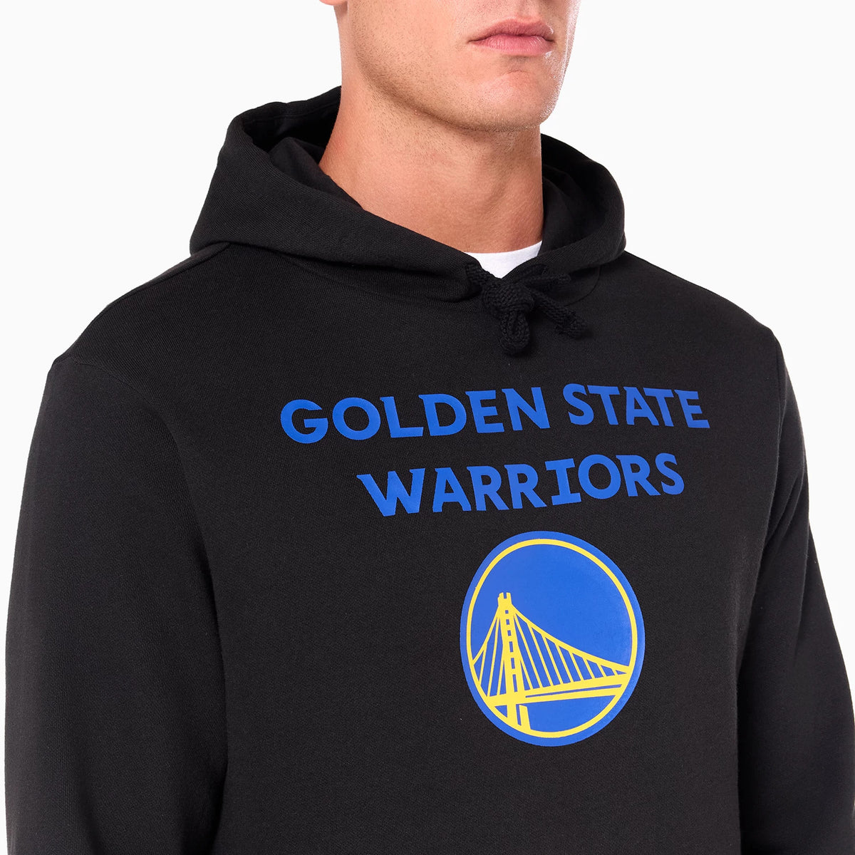 New Era Golden State Warriors NBA Black Pullover Hoodie, front view showing a black hoodie with a raised Golden State Warriors text in blue and a yellow bridge logo on the chest, worn by a model with the hood down.