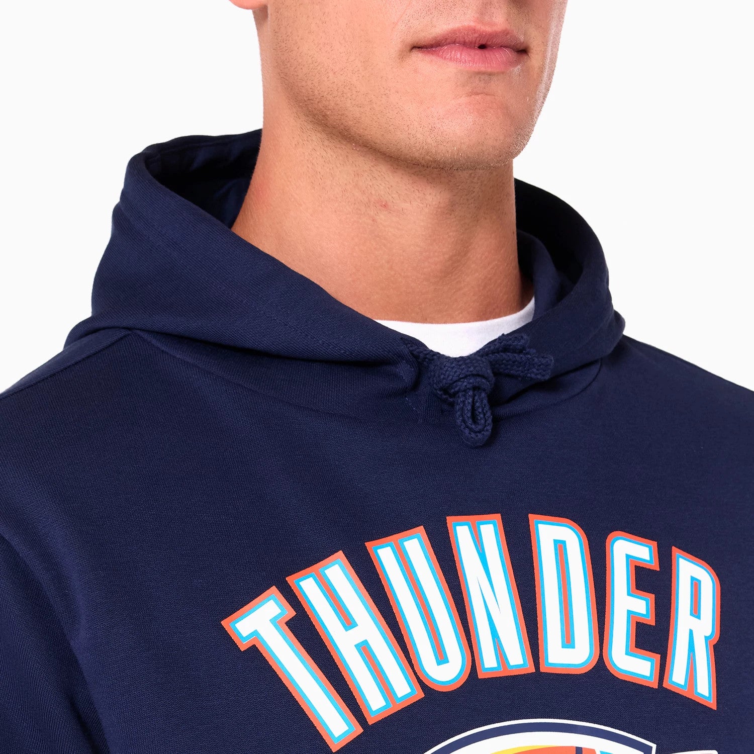 New Era Oklahoma City Thunder NBA Navy Pullover Hoodie, front view showing the large THUNDER text in vibrant colours across the chest, with a drawstring visible on the hood and no logos shown.