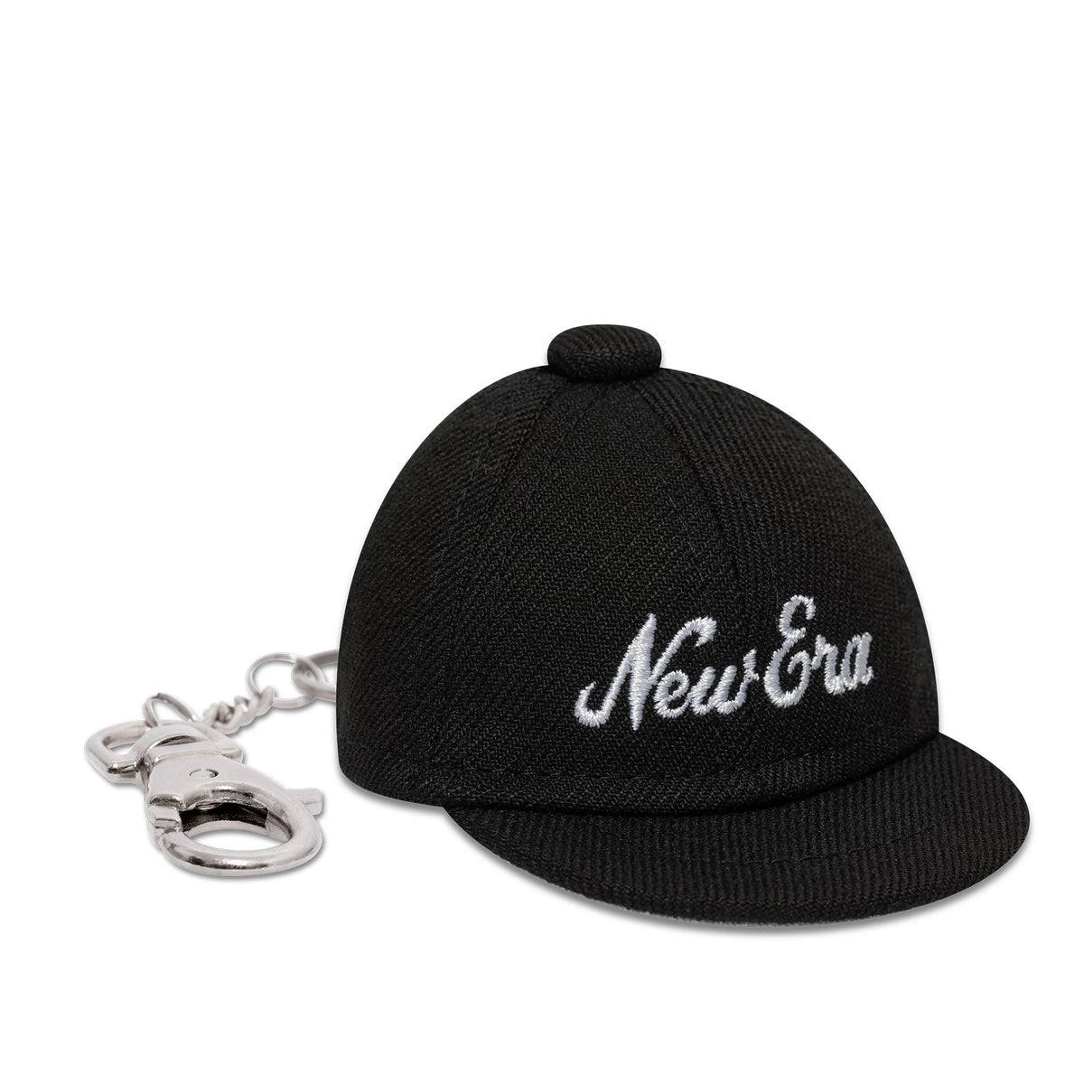 New Era New Era Mini Cap Black Key Chain, side view showing the embroidered New Era script logo on the front panel, featuring a black visor and a silver keychain attached to the back.