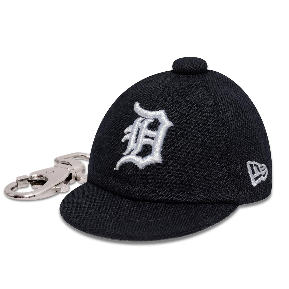 New Era Detroit Tigers MLB Mini Cap Navy Key Chain, three-quarter view showing a white embroidered white D logo on the front panel, a New Era flag logo on the left side, and a silver attachment clip.