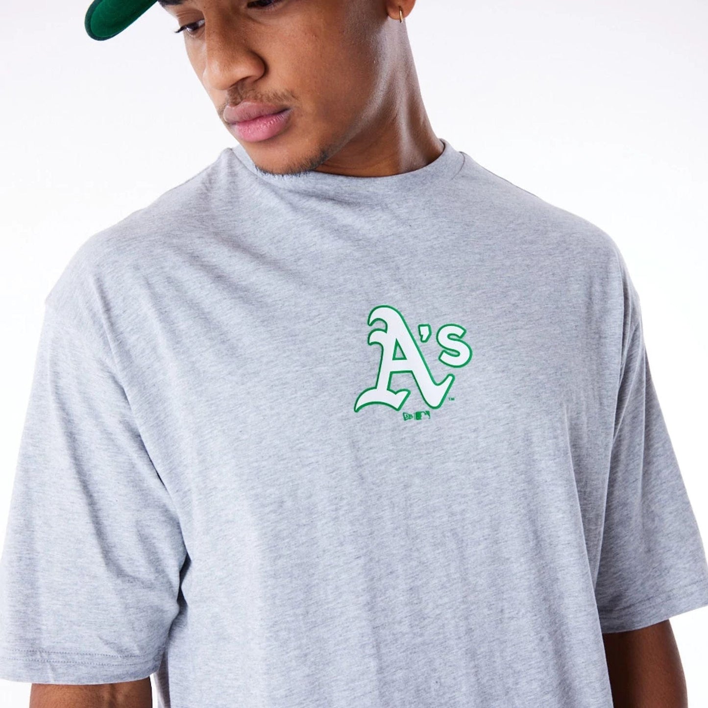 The Male model is wearing Oakland Athletics MLB World Series Grey Oversized T-Shirt 6