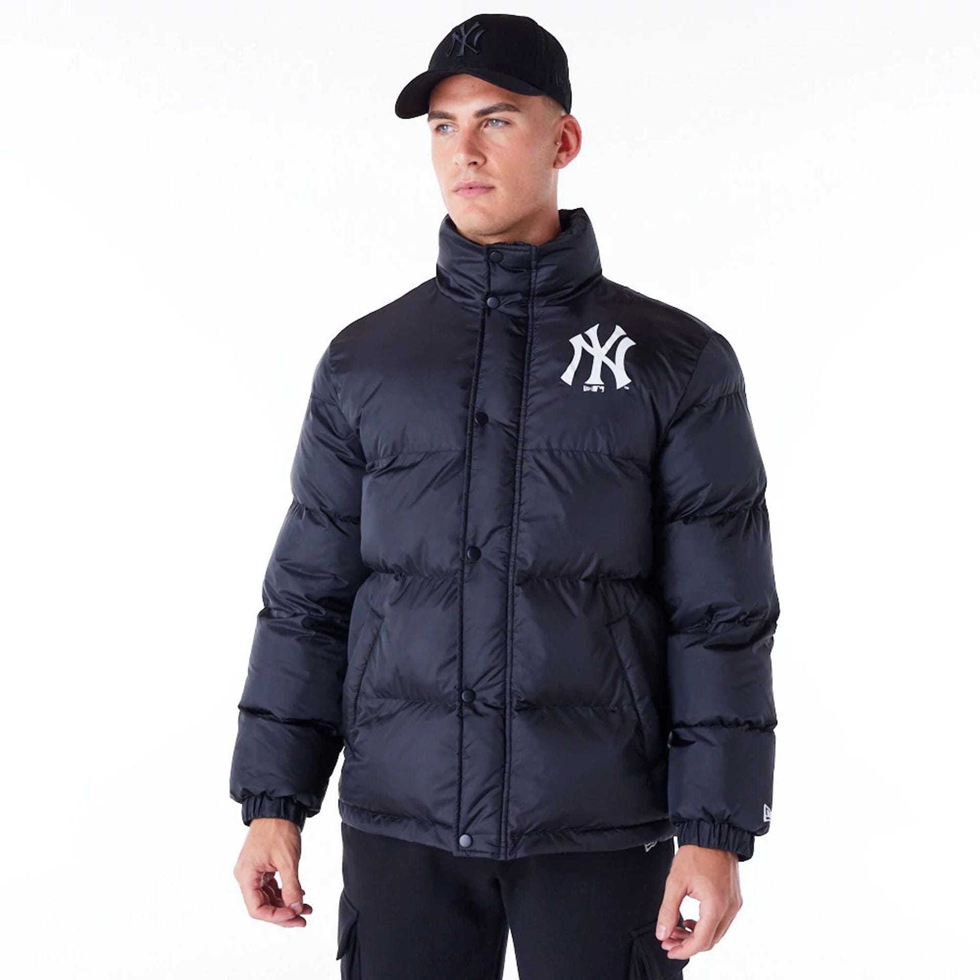 The Male model is wearing New York Yankees MLB Black Nylon Puffer Jacket 1