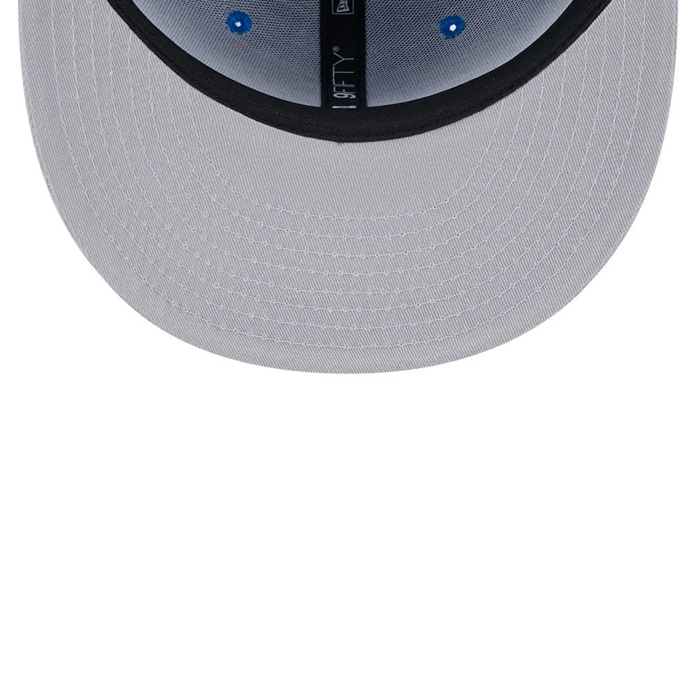 Detroit Lions NFL Evergreen Blue New Era 9FIFTY Snapback Adjustable Cap, inside view showing a grey undervisor with black taping and blue eyelets, with a 9FIFTY label on the taping.
