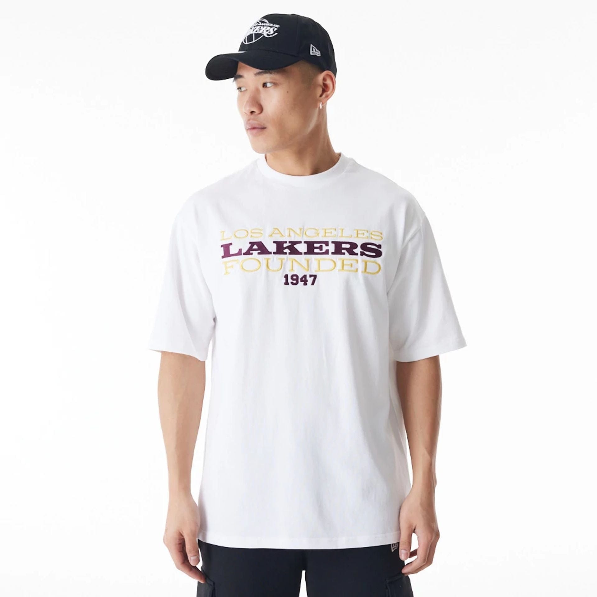 The Male model is wearing LA Lakers NBA Lifestyle White T-Shirt 1