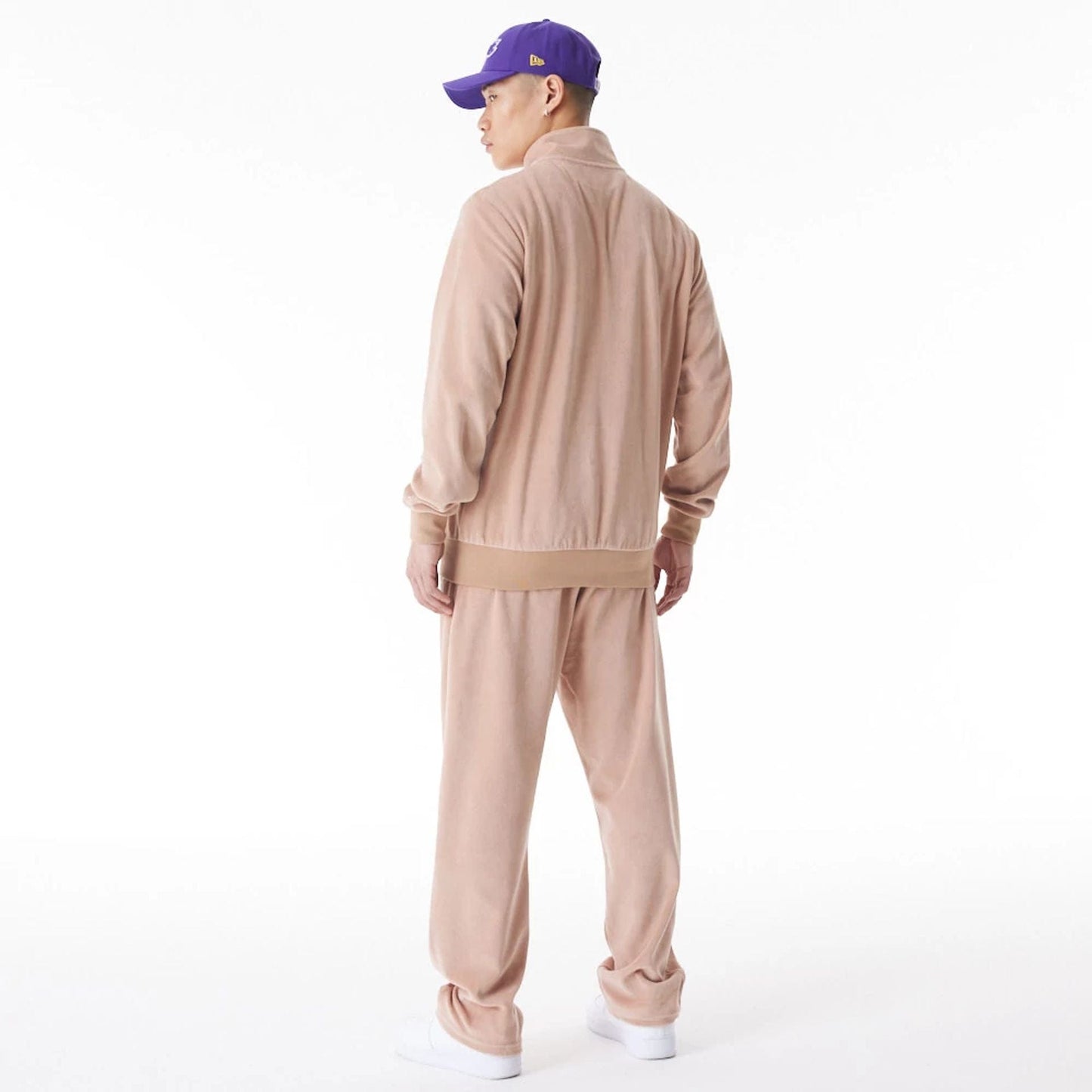 The Male model is wearing LA Lakers NBA Lifestyle Velour Beige Track Jacket 9