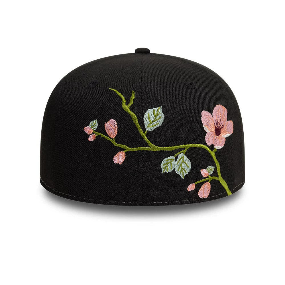 New Era Floral Emblem Black 59FIFTY Fitted Cap, rear view showing detailed pink and green embroidered floral design branching across the back panels, set against the structured black crown.