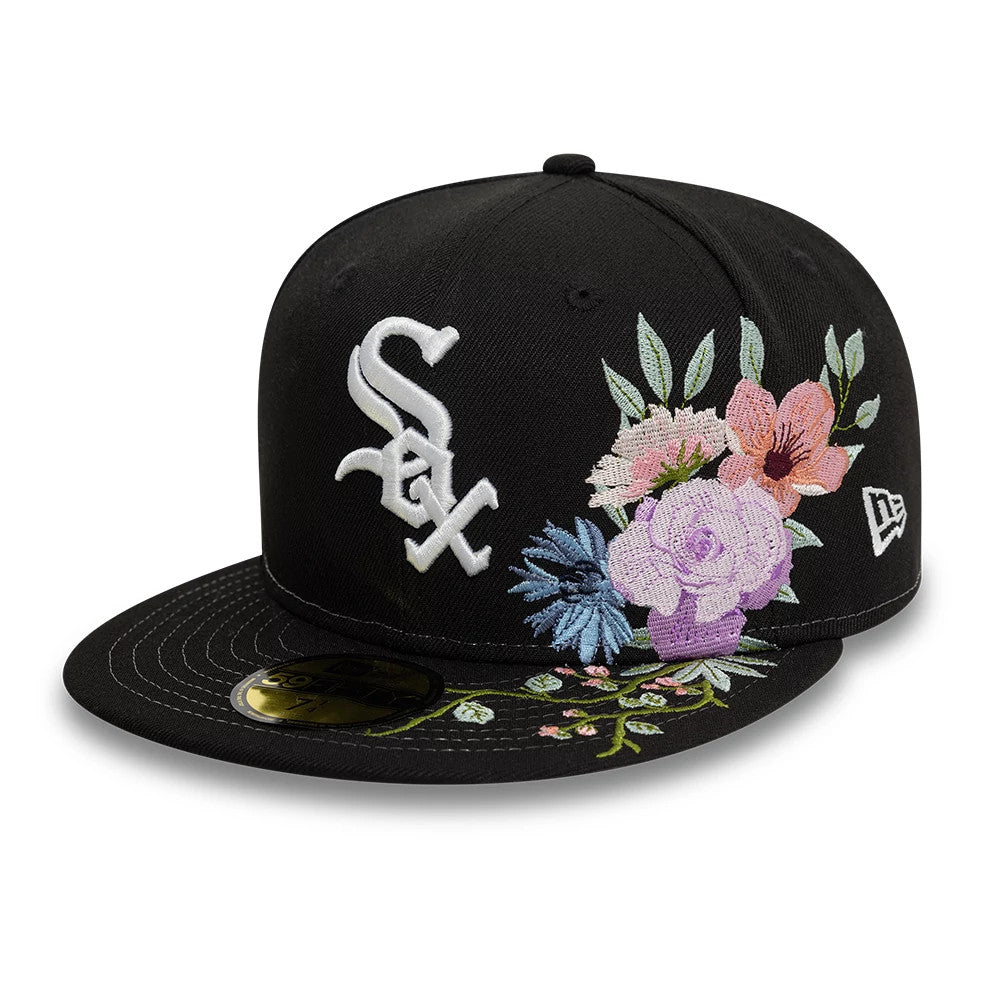 Chicago White Sox MLB Floral Black New Era 59FIFTY Fitted Cap, front view with raised white Sox logo on the front panel, colourful floral embroidery on the right panel, and the gold 59FIFTY size sticker on the black visor.