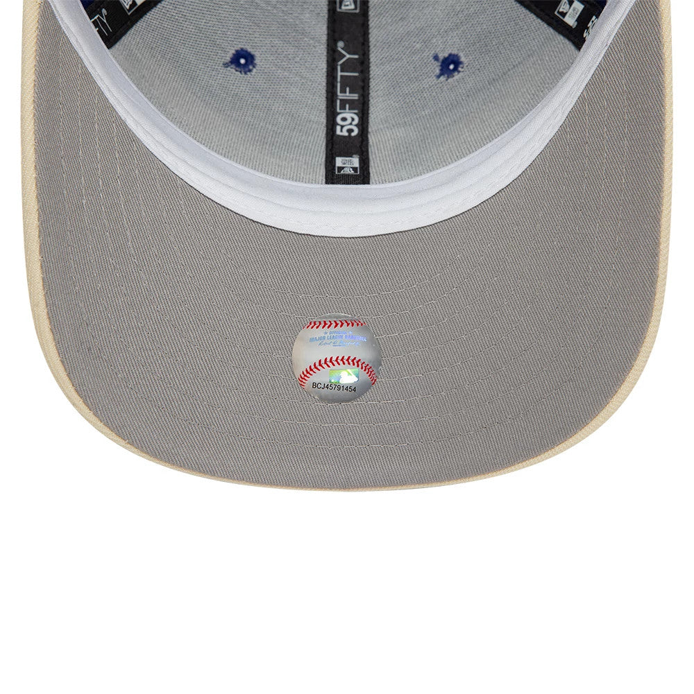 LA Dodgers MLB Team Wings Navy New Era 59FIFTY Fitted Cap, inside view showing grey undervisor with MLB holographic sticker, black taping with 59FIFTY branding, and contrasting white sweatband around the crown edge.