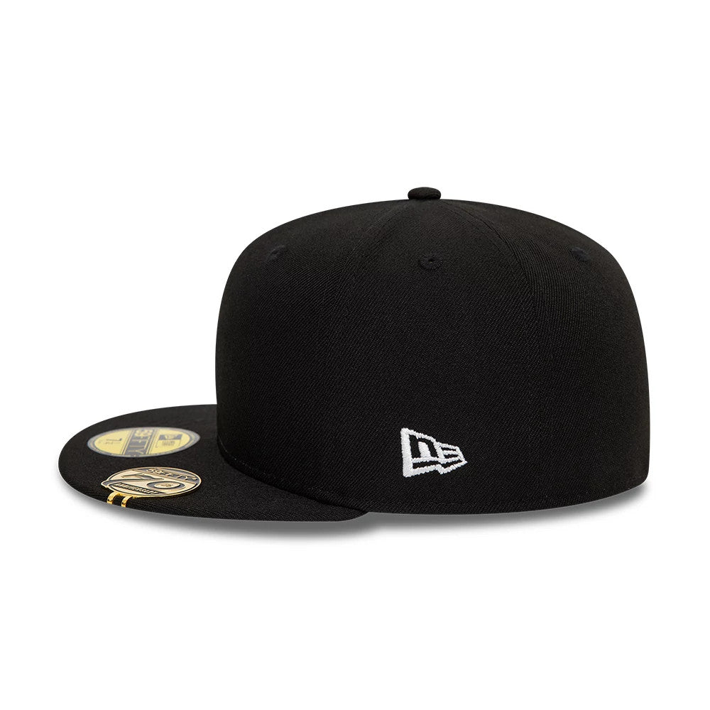 New Era Side Script Black New Era 59FIFTY Fitted Cap, side view showing the white embroidered New Era flag logo on the left side, with a flat black visor and gold 59FIFTY size sticker on top.