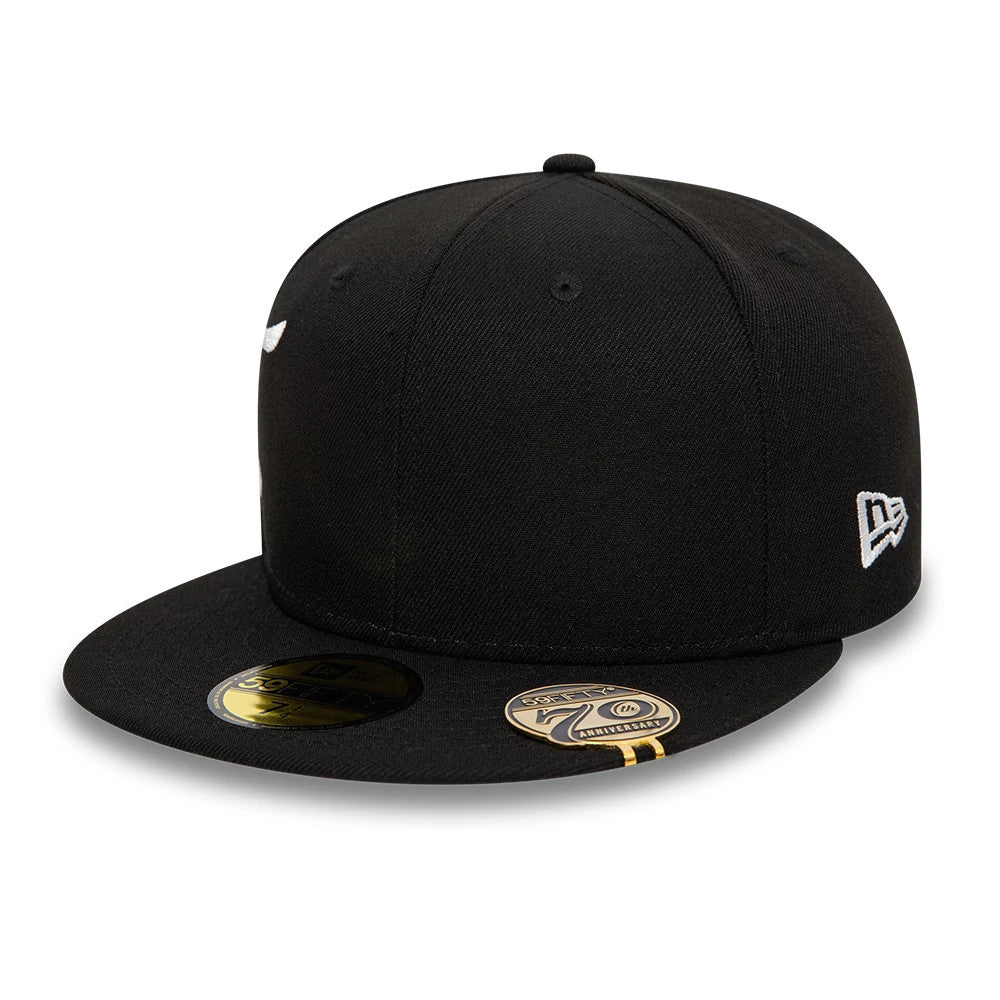 New Era Side Script Black New Era 59FIFTY Fitted Cap, three-quarter view showing the gold 59FIFTY size sticker on the black visor and the white embroidered New Era flag logo on the left side of the structured crown.