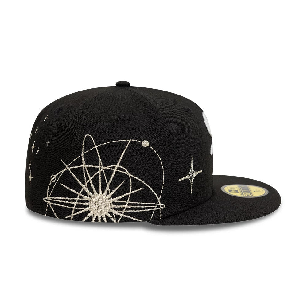 Chicago White Sox MLB Zodiac Black New Era 59FIFTY Fitted Cap, side view showing an intricate beige zodiac design on the black structured crown with a black flat visor and gold 59FIFTY size sticker on the top.