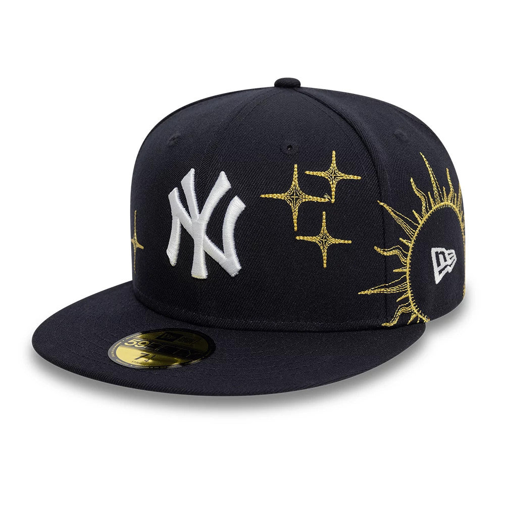 New York Yankees MLB Zodiac Navy New Era 59FIFTY Fitted Cap, front view showing a white embroidered NY logo on the front panel, gold sunburst and star embroidery, a New Era flag logo on the left side, and a gold 59FIFTY size sticker on the visor.