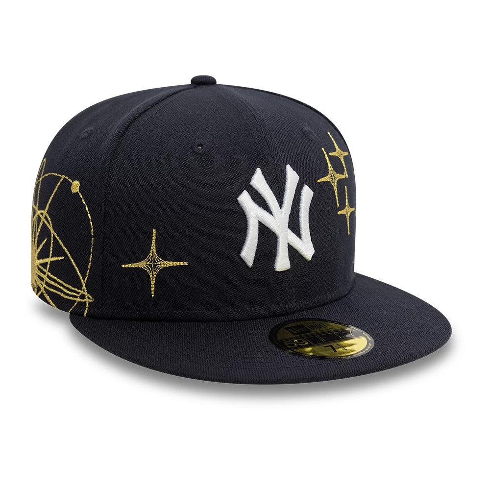 New York Yankees MLB Zodiac Navy New Era 59FIFTY Fitted Cap, three-quarter view showing gold zodiac embroidery on the front and side panels, a white Yankees logo on the front, and a gold 59FIFTY size sticker on the navy visor.