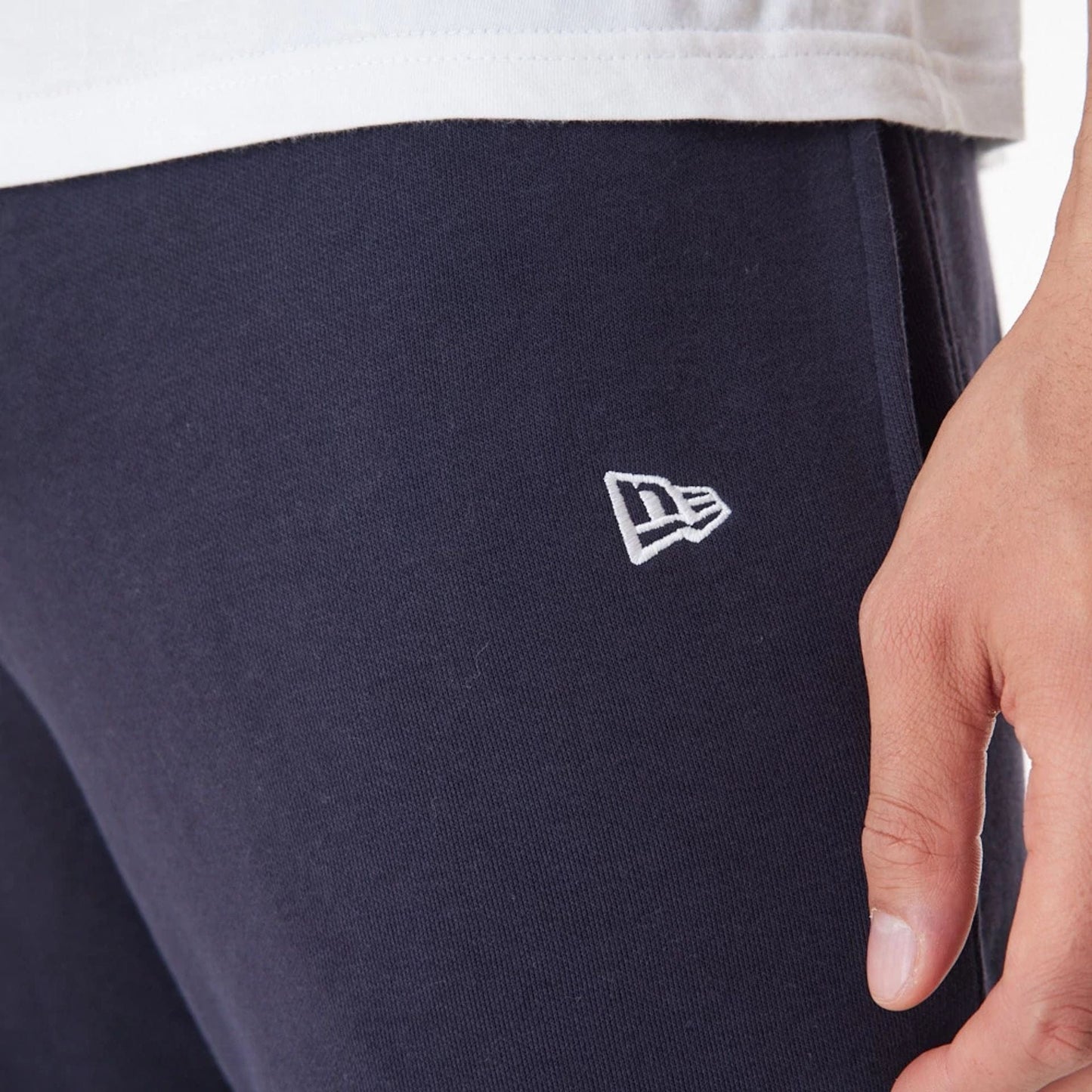 The Male model is wearing New York Yankees MLB Gradient Graphic Navy Joggers 9