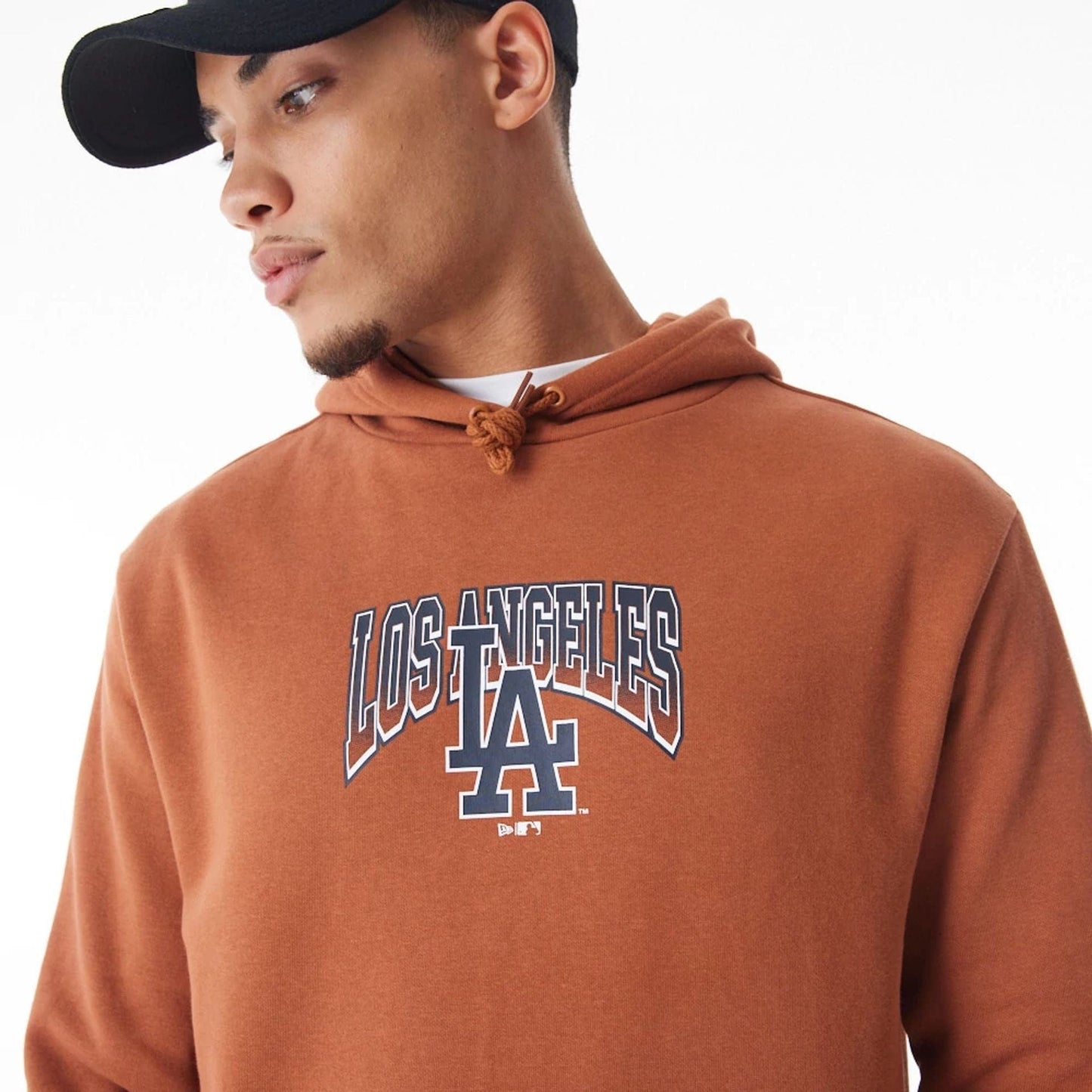 The Male model is wearing LA Dodgers MLB Gradient Brown Oversized Pullover Hoodie 9