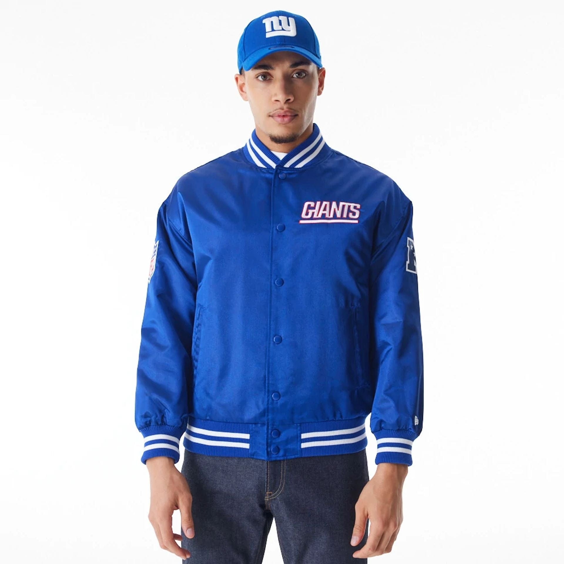The Male model is wearing New York Giants NFL Blue Satin Bomber Jacket 1