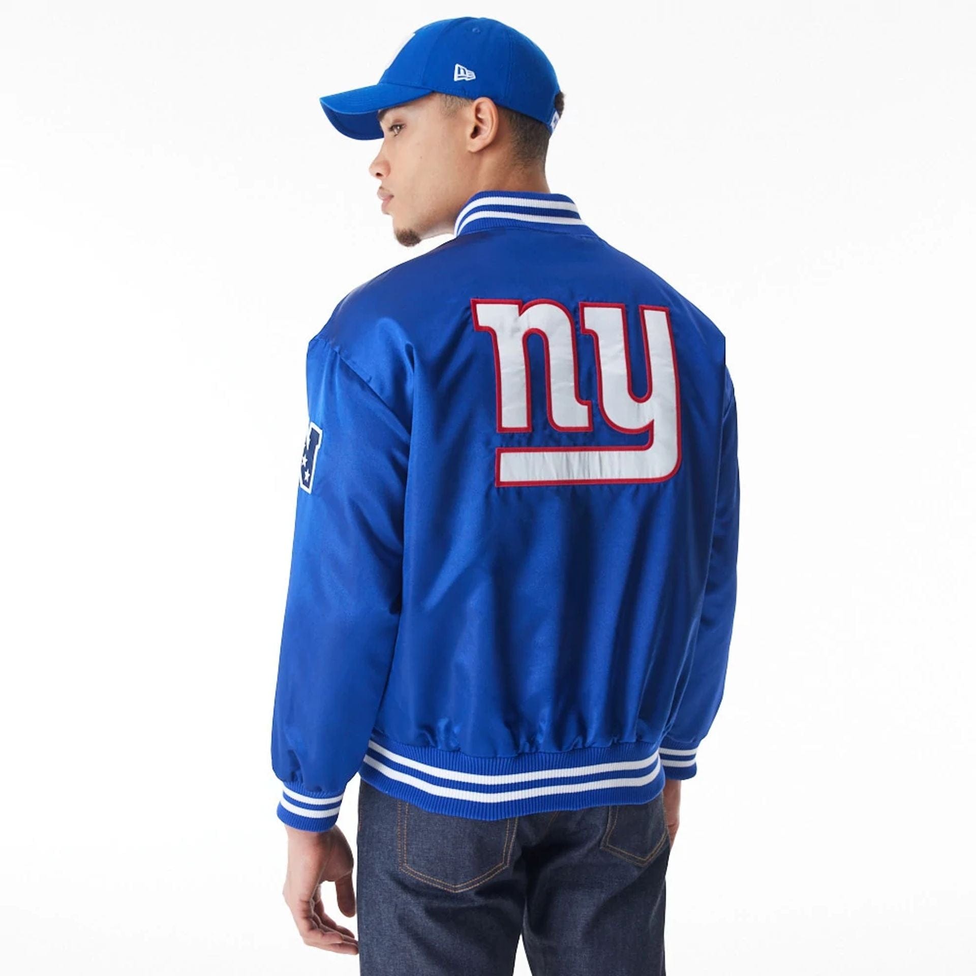 The Male model is wearing New York Giants NFL Blue Satin Bomber Jacket 2