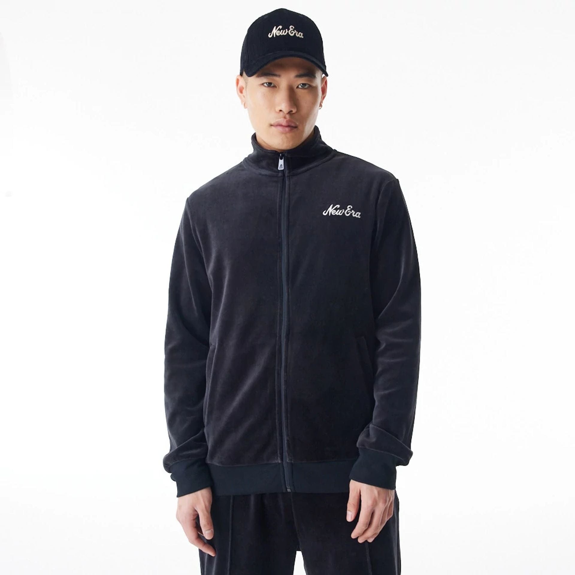 The Male model is wearing New Era Velour Black Track Jacket 2