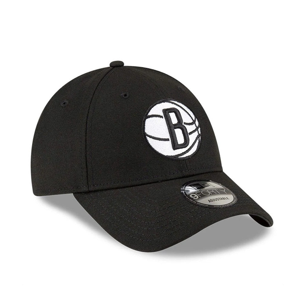 Brooklyn Nets NBA The League Black New Era 9FORTY Adjustable Cap, front view showing the raised embroidered white B logo on the front panel, a curved visor, and the 9FORTY size sticker on the top of the visor.