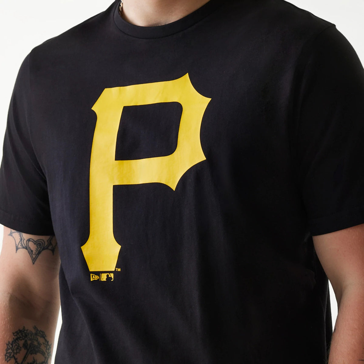 New Era Pittsburgh Pirates MLB Regular Black T-Shirt, front view showing a large yellow 'P' logo centred on the chest with a small New Era logo and MLB logo beneath, on a black background.